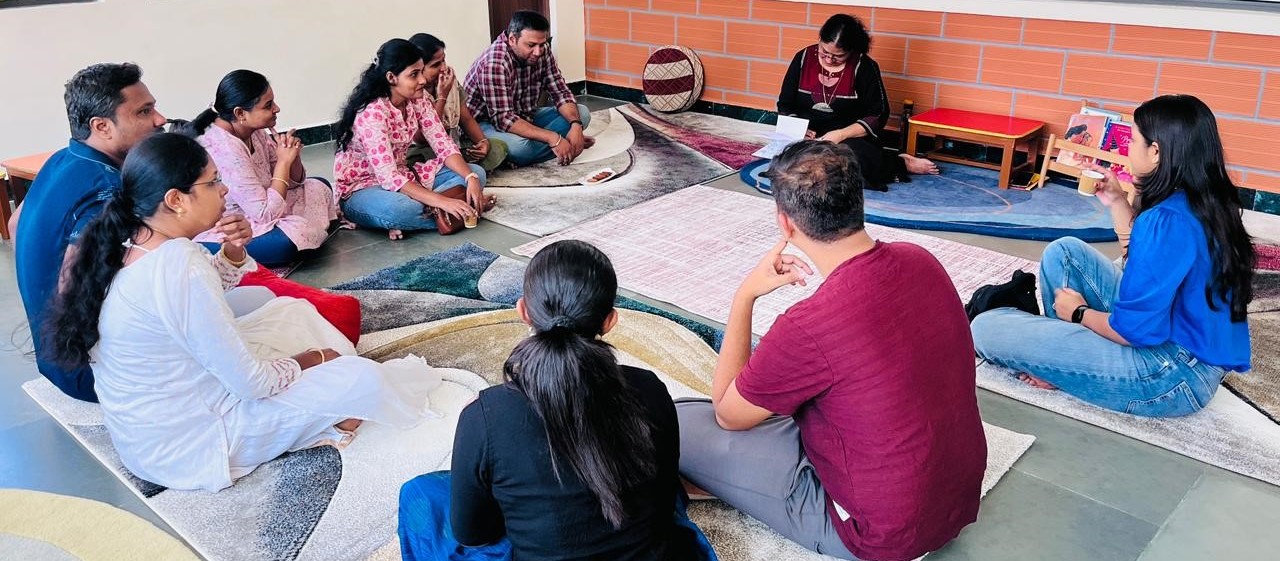 Parents and child at school